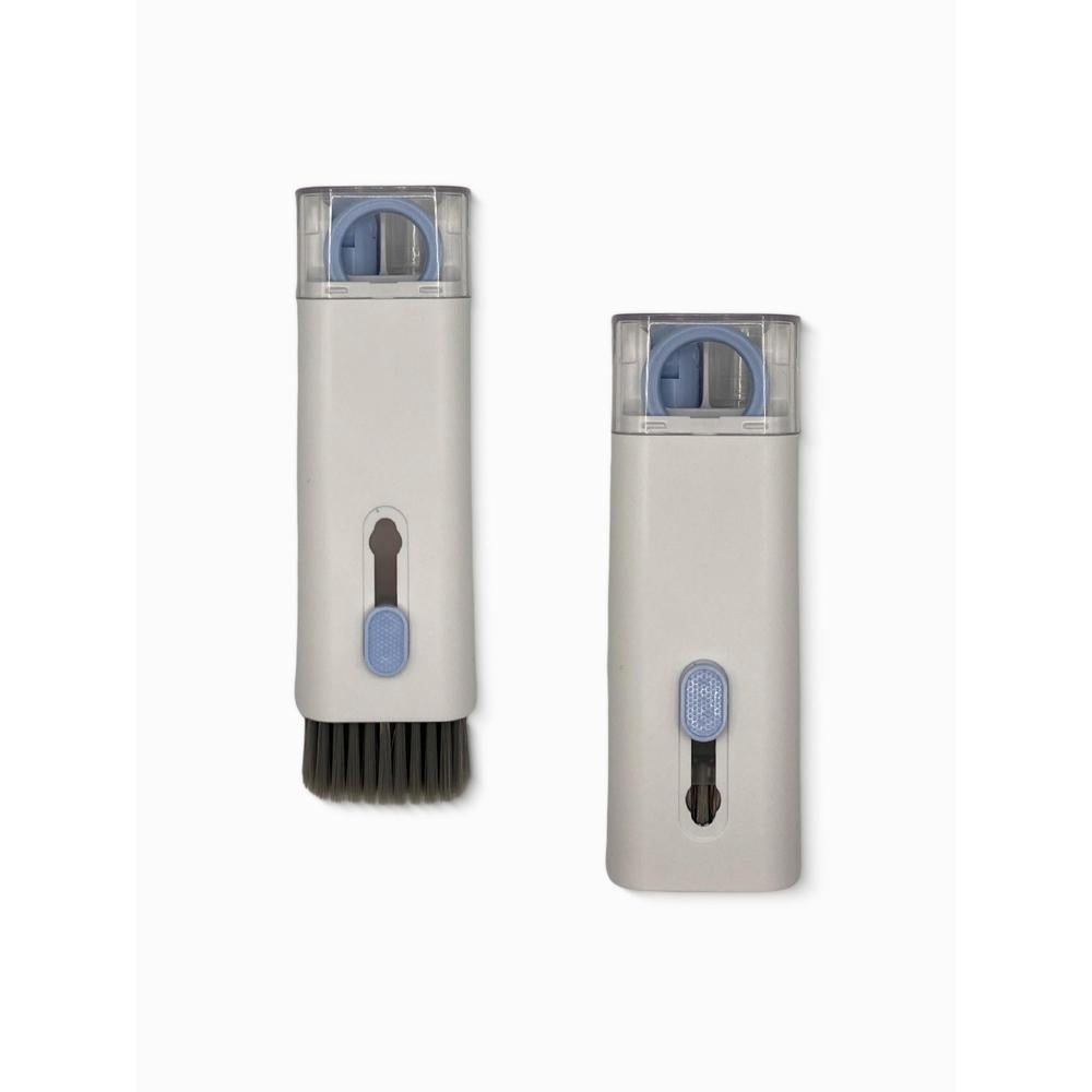 Two tech cleaning kits with brush attachments on a white background