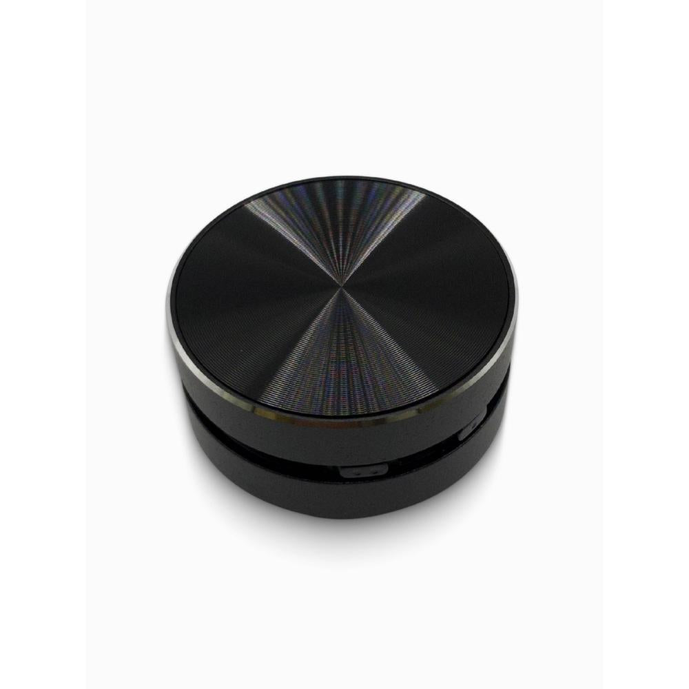 Black bluetooth speaker with reflective surface on a white background