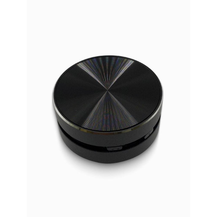 Black bluetooth speaker with reflective surface on a white background