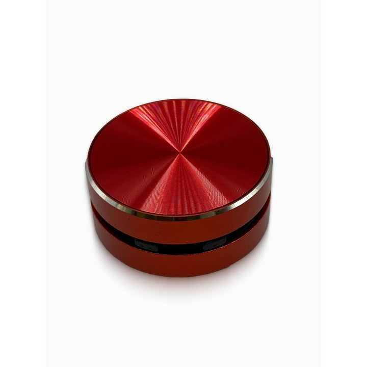 Red bluetooth speaker on a white background