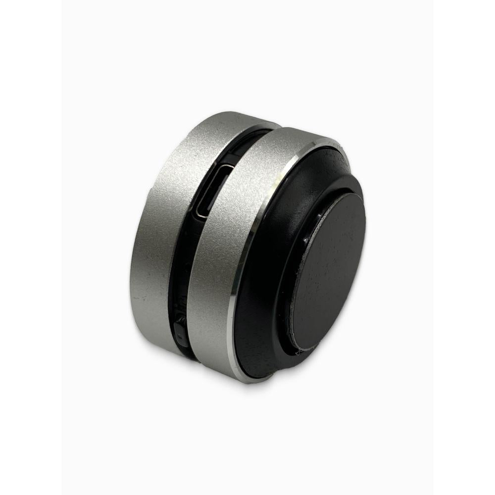 Silver bluetooth speaker on a white background