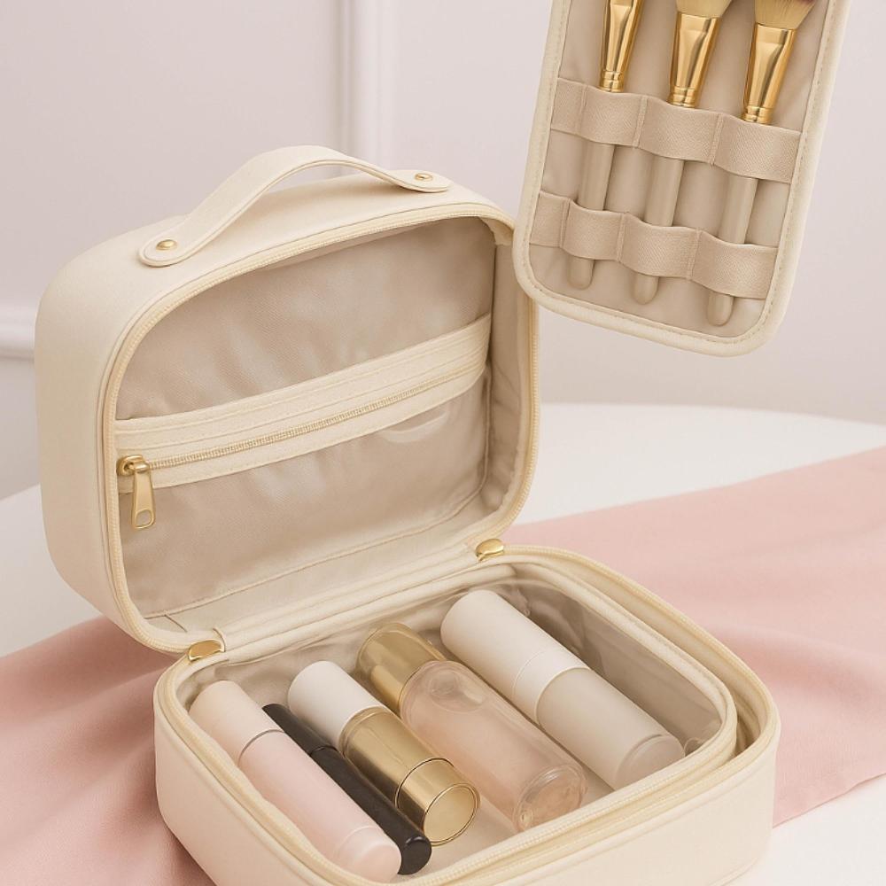 Beige toiletry organizer with lipsticks and brushes on a pink background