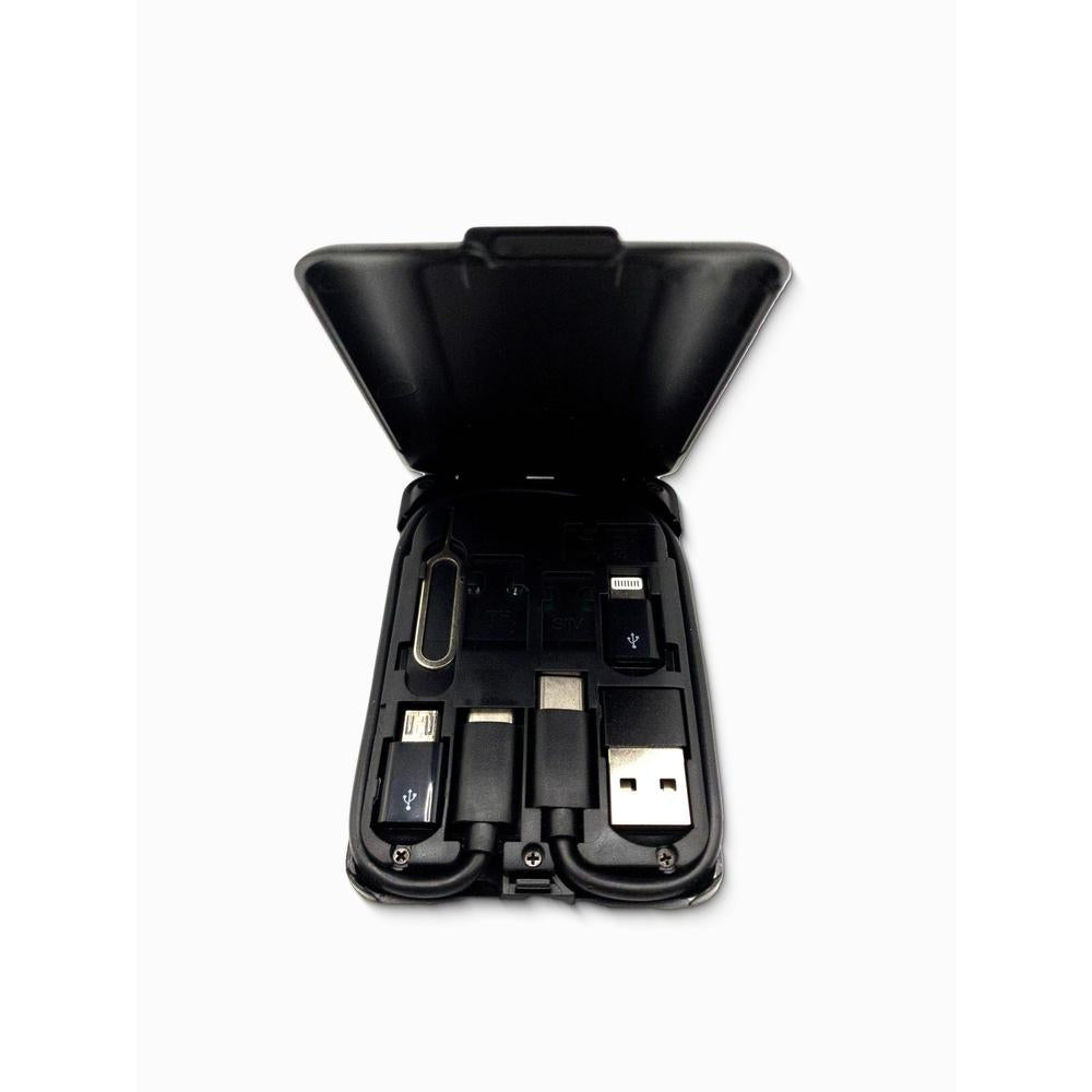 Black charging dock with electronic components on a white background