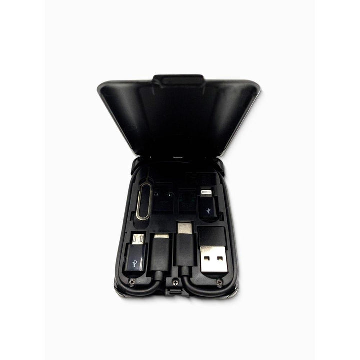Black charging dock with electronic components on a white background
